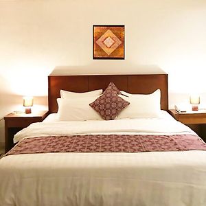 Habitación Estándar con Cama Queen